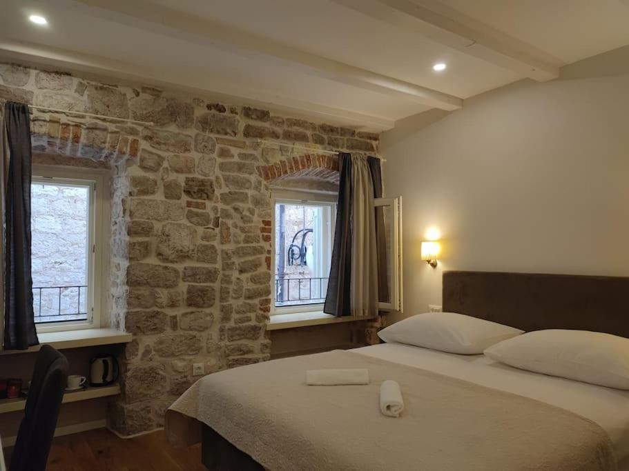 Posteľ alebo postele v izbe v ubytovaní S-Rooms