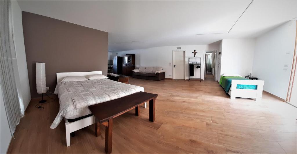 Postel nebo postele na pokoji v ubytování B&B Baratoff
