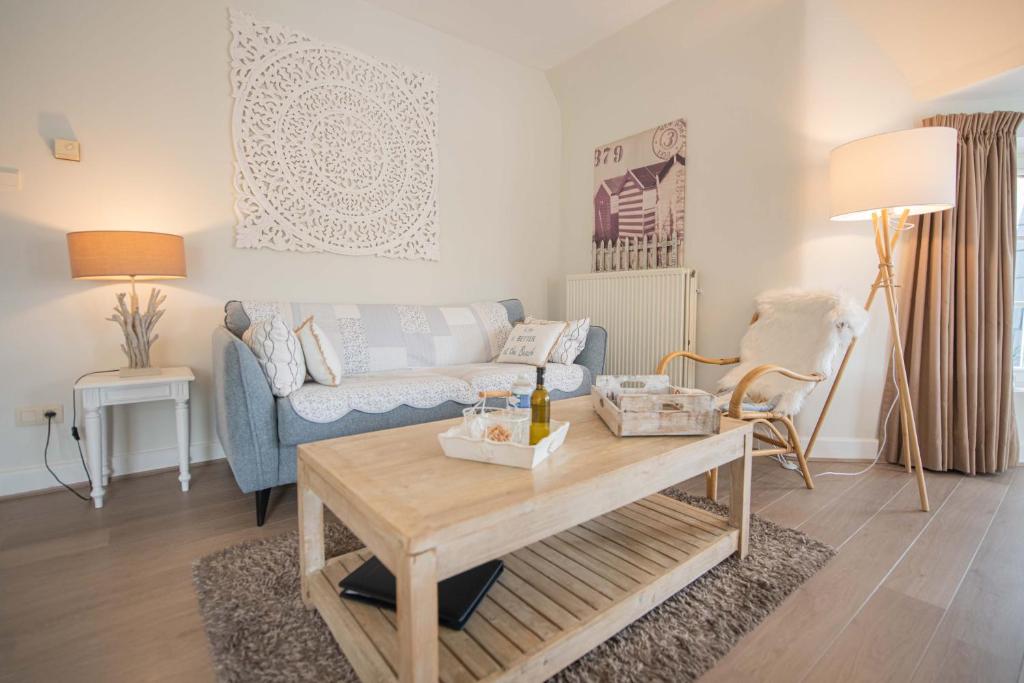 Ένα ή περισσότερα κρεβάτια σε δωμάτιο στο Appartementen Villa La Palette
