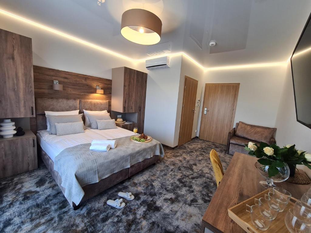 Postel nebo postele na pokoji v ubytování BALTIC RESIDENCE