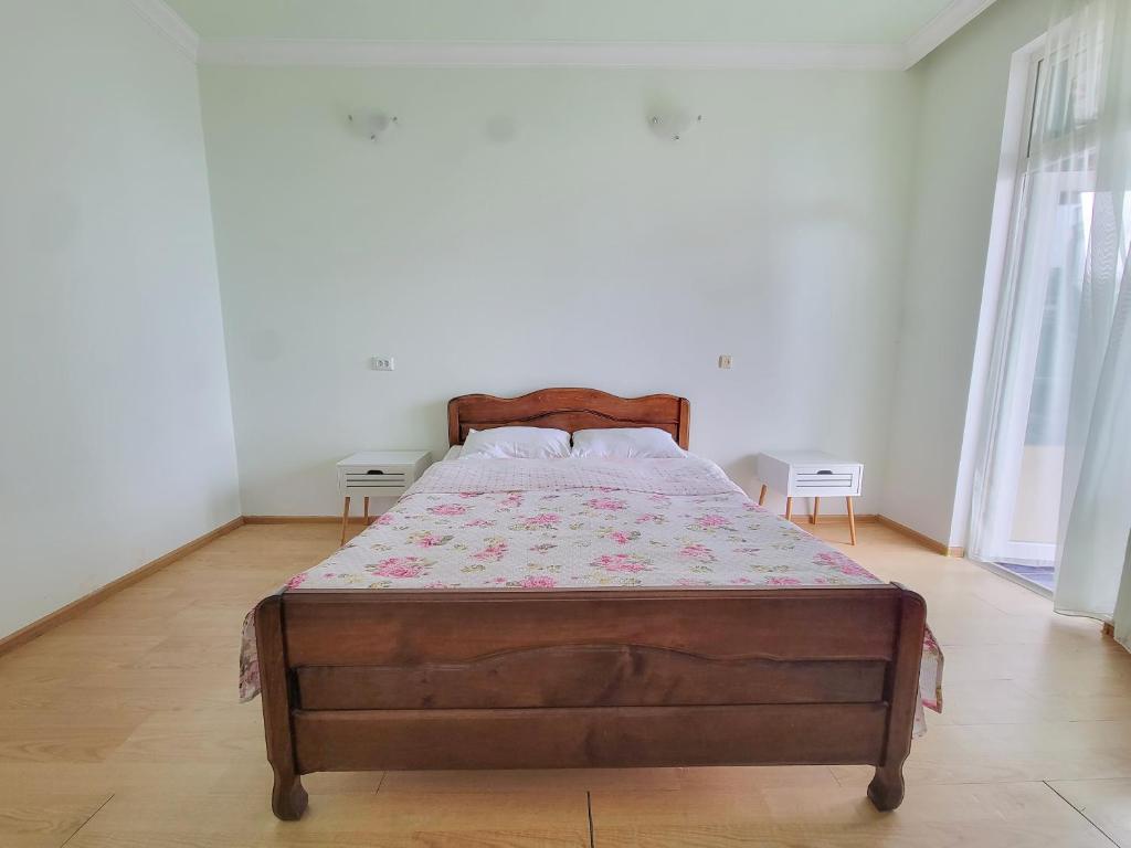 Postel nebo postele na pokoji v ubytování Kvariati Residence