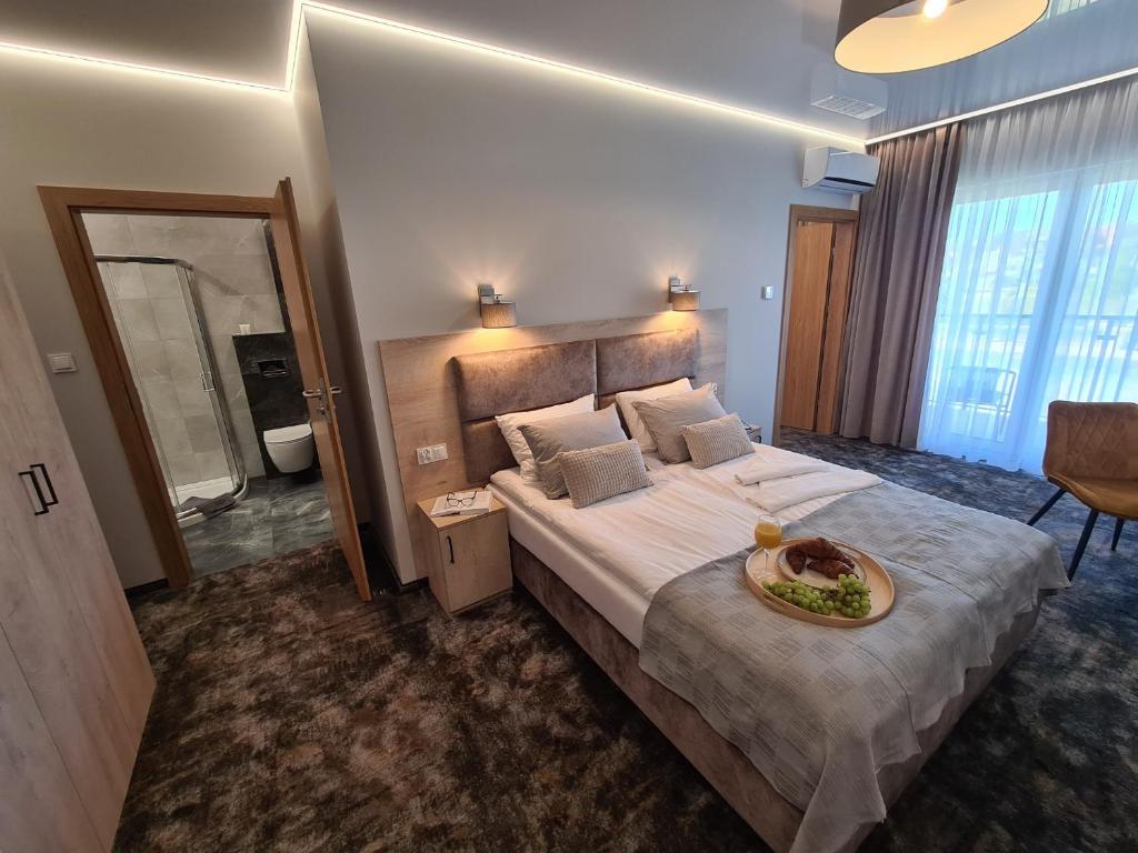 Postel nebo postele na pokoji v ubytování BALTIC RESIDENCE