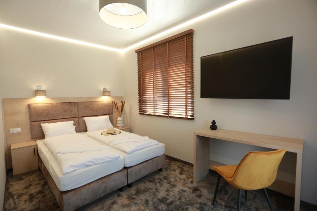 Postel nebo postele na pokoji v ubytování BALTIC RESIDENCE