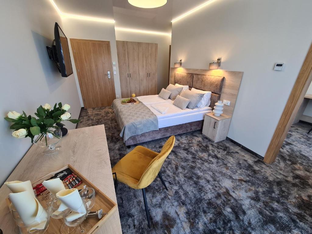 Postel nebo postele na pokoji v ubytování BALTIC RESIDENCE
