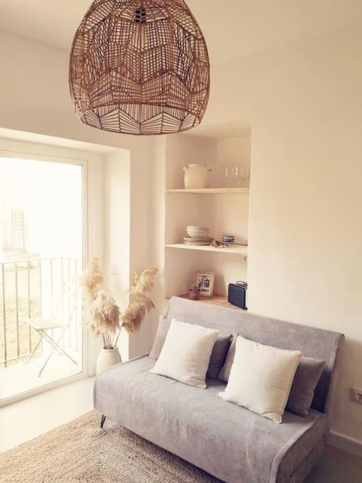 Postel nebo postele na pokoji v ubytování Casa Cimita in der Altstadt mit Balkon