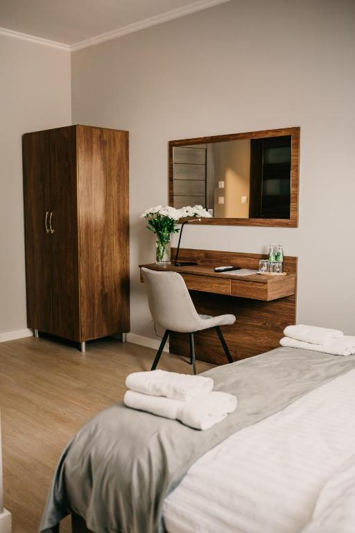 Posteľ alebo postele v izbe v ubytovaní Hotel Millenium
