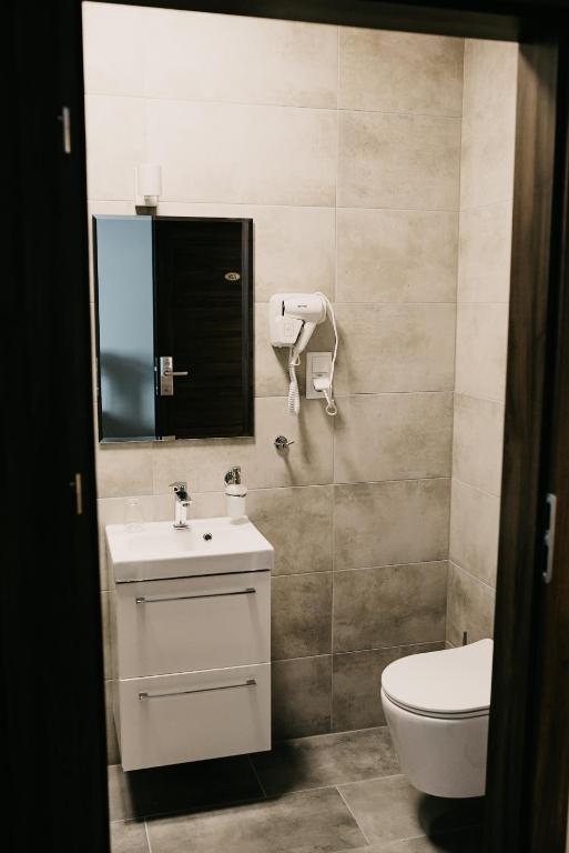 Kúpeľňa v ubytovaní Hotel Millenium