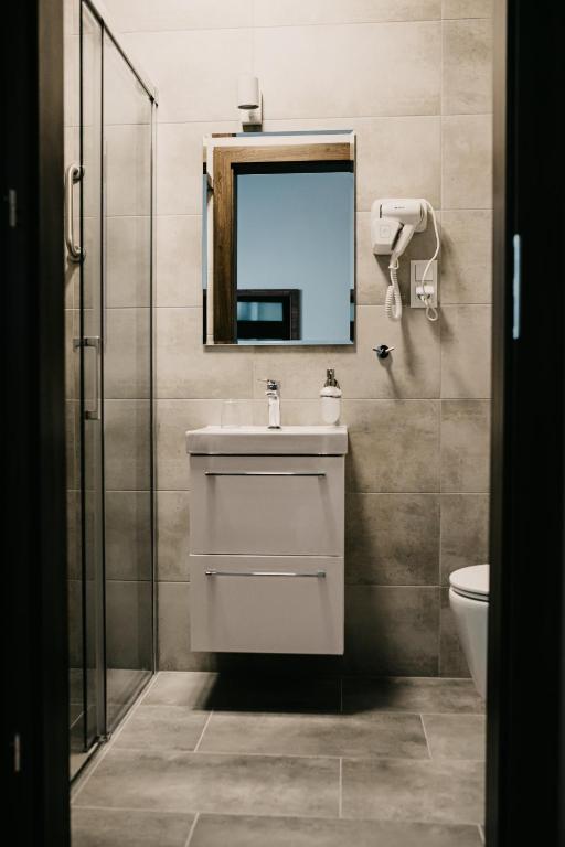 Kúpeľňa v ubytovaní Hotel Millenium