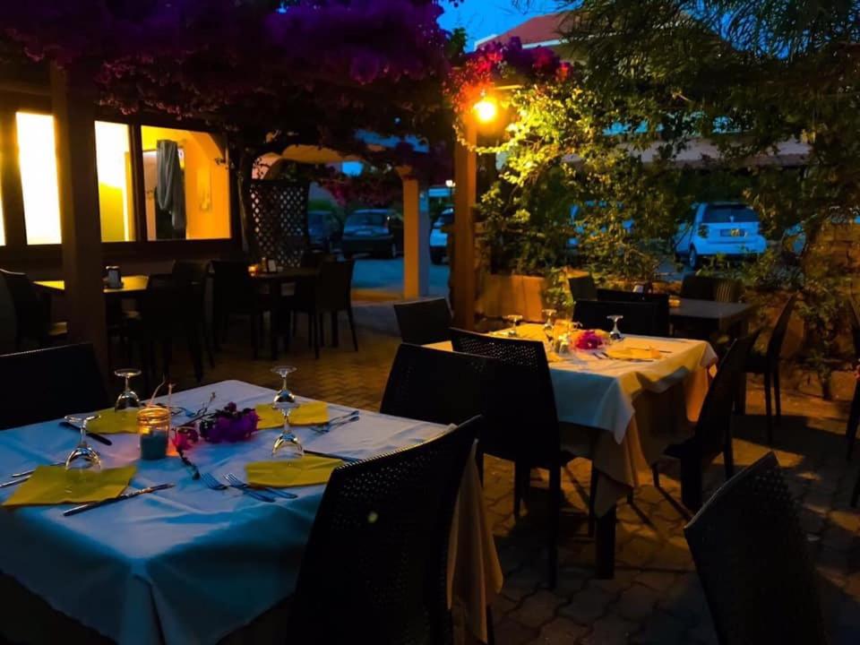 Ресторант или друго място за хранене в Cala Reale Rooms Marinella