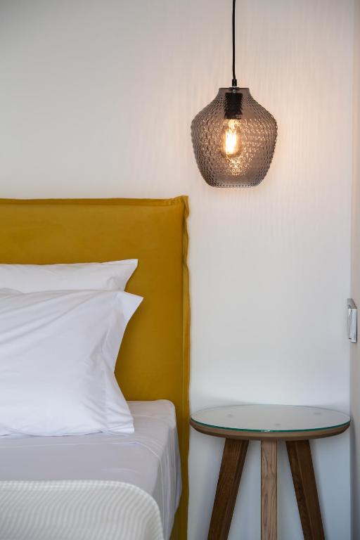 Posteľ alebo postele v izbe v ubytovaní Azul Apartments