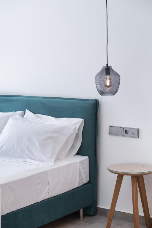 Posteľ alebo postele v izbe v ubytovaní Azul Apartments