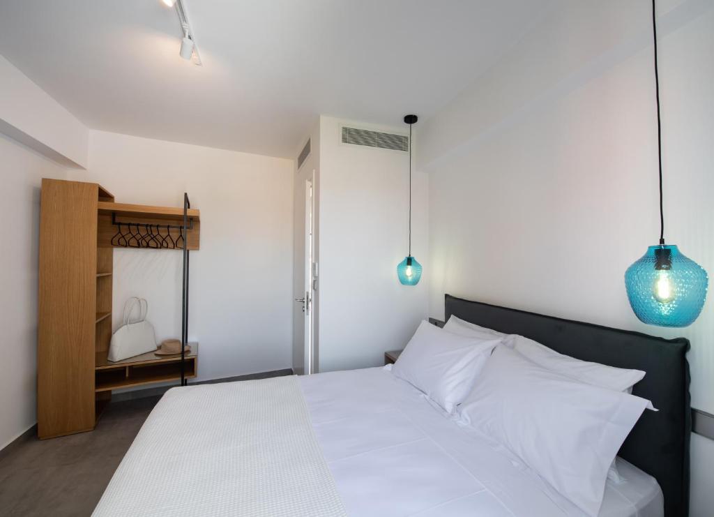 Posteľ alebo postele v izbe v ubytovaní Azul Apartments
