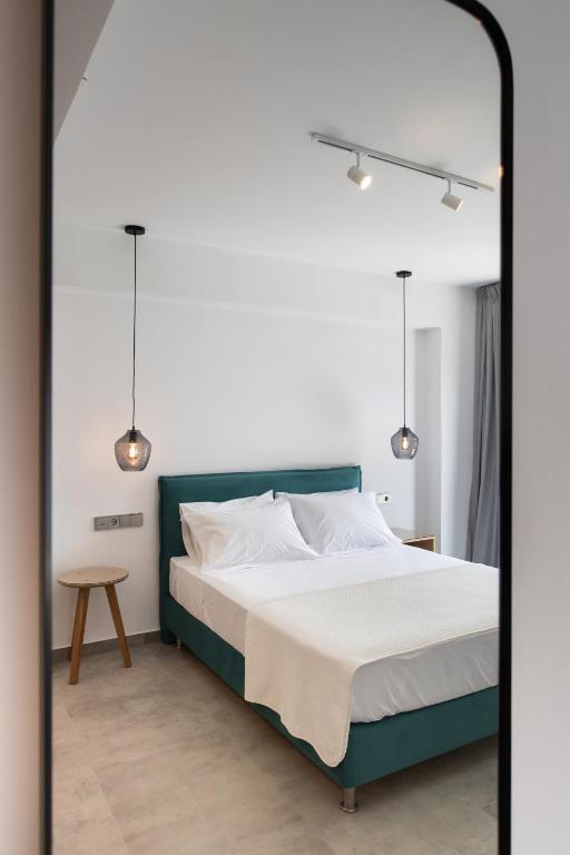 Posteľ alebo postele v izbe v ubytovaní Azul Apartments
