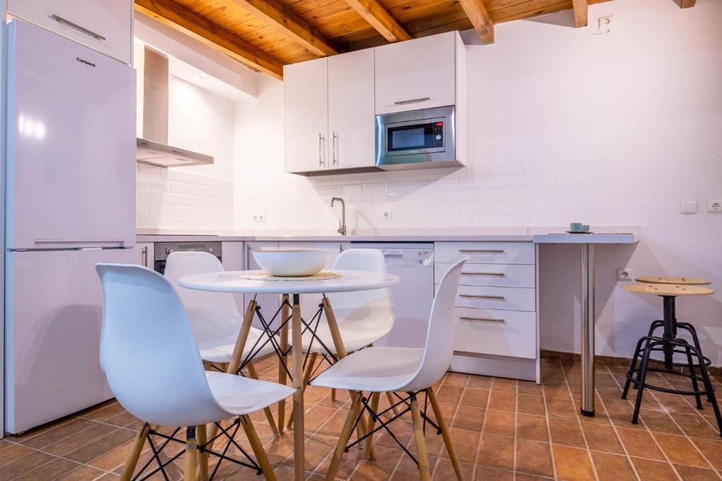 Kuchyň nebo kuchyňský kout v ubytování Apartamento Macarena, en el Centro de Sevilla