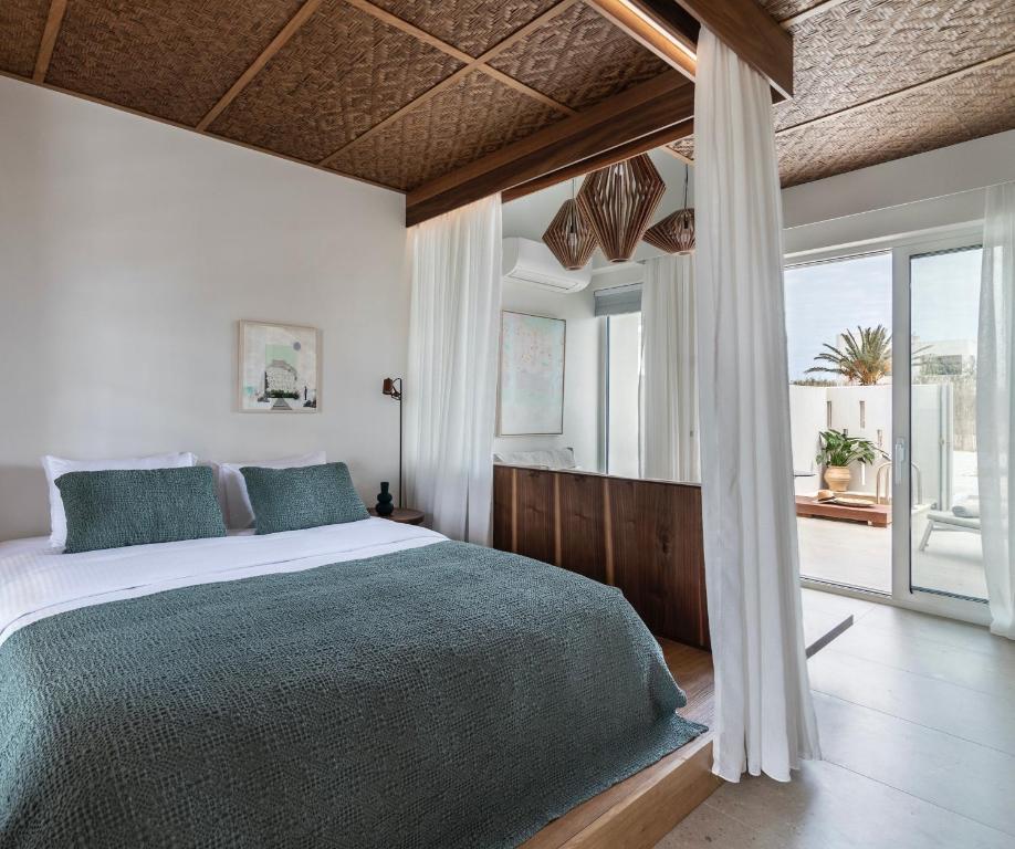 Posteľ alebo postele v izbe v ubytovaní ALERÓ Seaside Skyros Resort