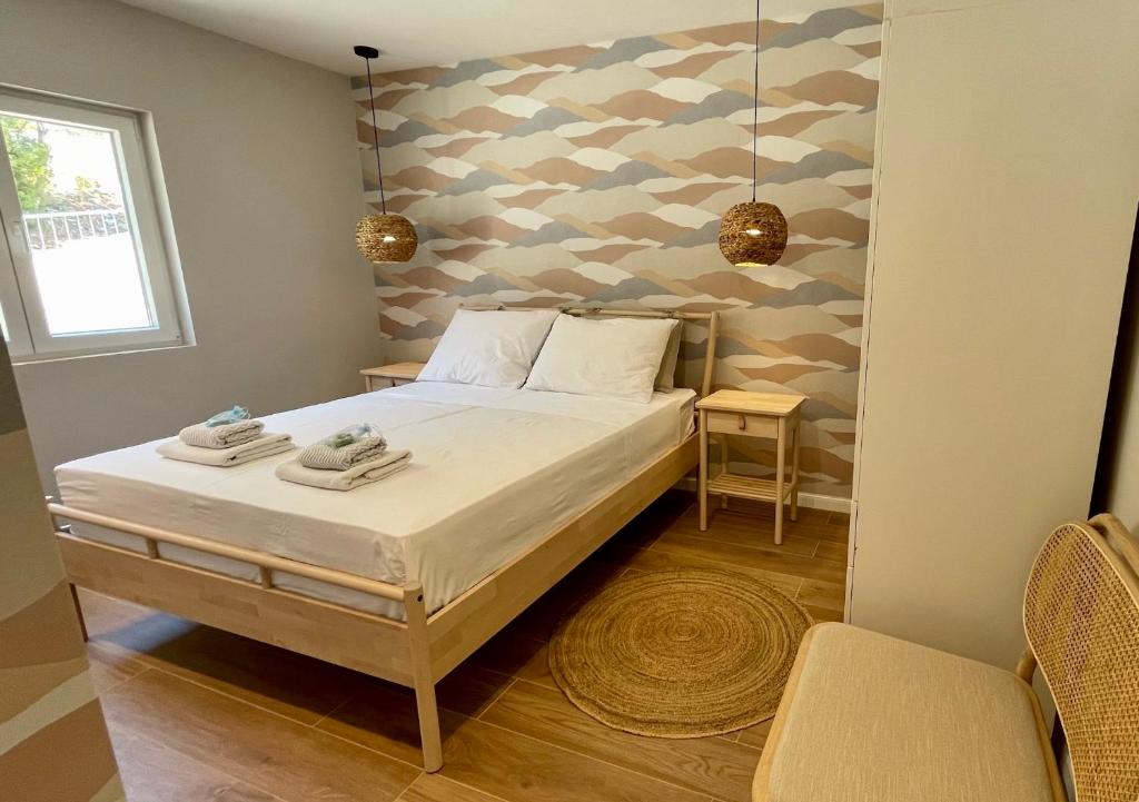 Postel nebo postele na pokoji v ubytování ViSun Apartment 1