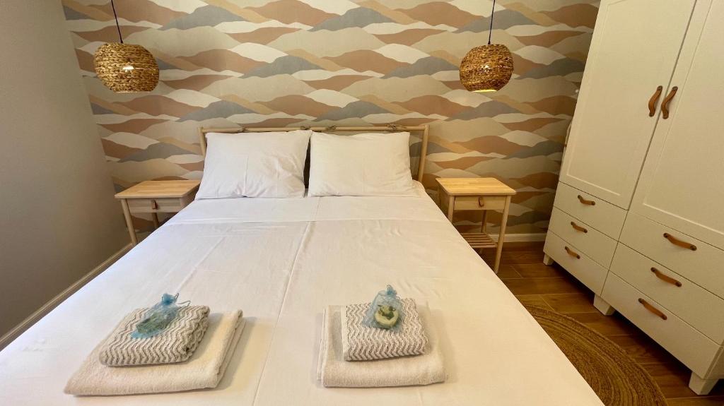 Postel nebo postele na pokoji v ubytování ViSun Apartment 1