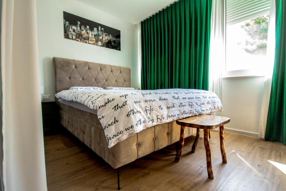 Posteľ alebo postele v izbe v ubytovaní Apartment Sika