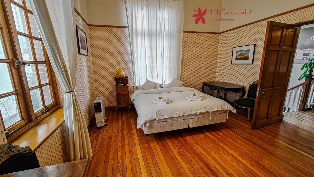 Katil atau katil-katil dalam bilik di Hotel Boutique El Consulado