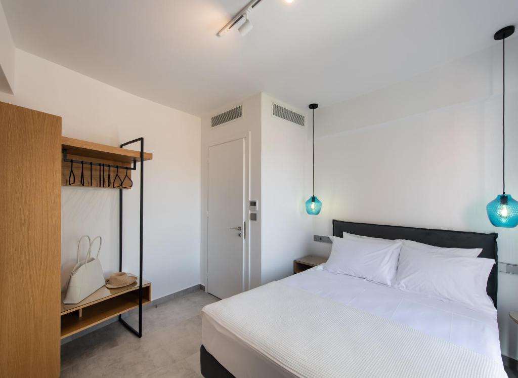 Posteľ alebo postele v izbe v ubytovaní Azul Apartments