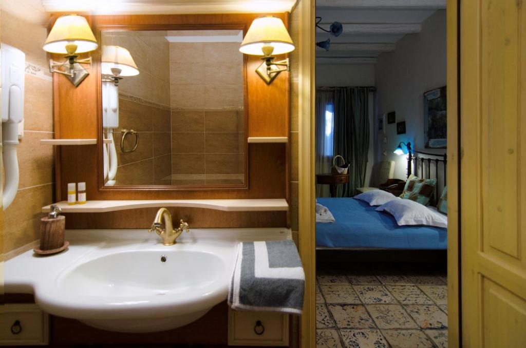 Postel nebo postele na pokoji v ubytování Panorama Exclusive Suites