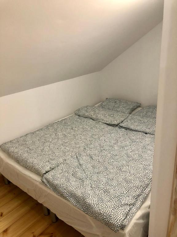 Posteľ alebo postele v izbe v ubytovaní Mazurski Dom