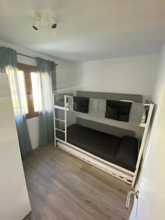 Posteľ alebo postele v izbe v ubytovaní Apartamento Cala Montgo