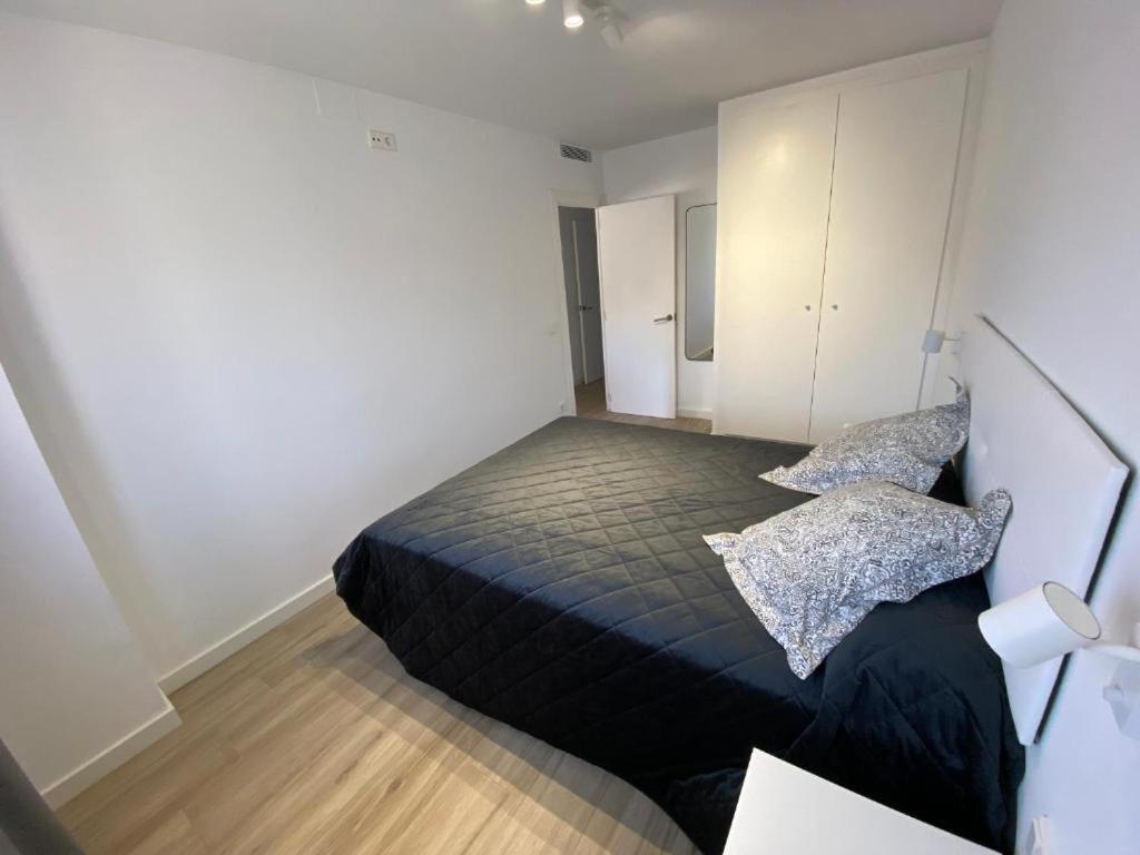 Posteľ alebo postele v izbe v ubytovaní Apartamento Cala Montgo