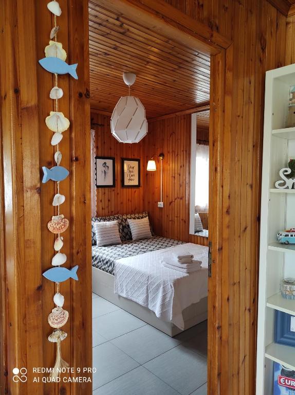 Postel nebo postele na pokoji v ubytování DemiNik Summer House
