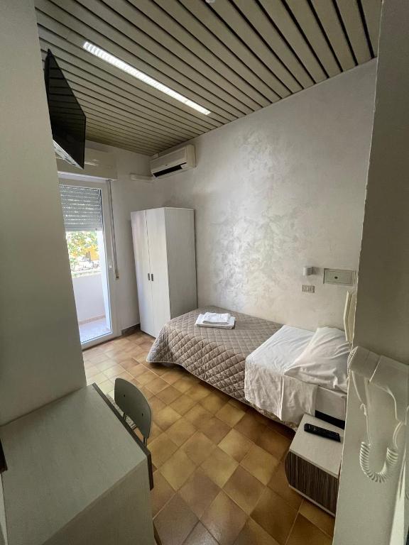 Postel nebo postele na pokoji v ubytování Hotel Adler