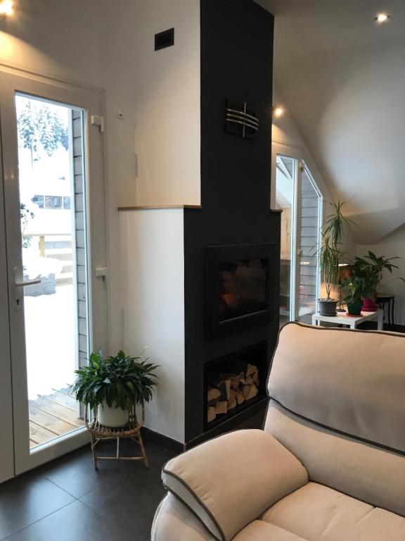 Część wypoczynkowa w obiekcie Le Grand Sapin. Maison au calme proche commerces