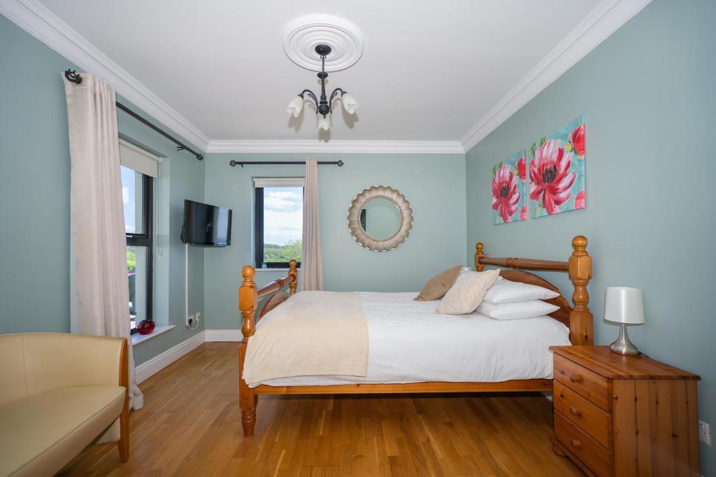 Postel nebo postele na pokoji v ubytování Fintra Beach B&B