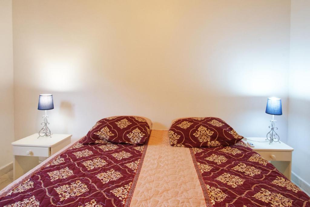 Postel nebo postele na pokoji v ubytování Charmant logement F3 au sud de la Martinique (PMR)