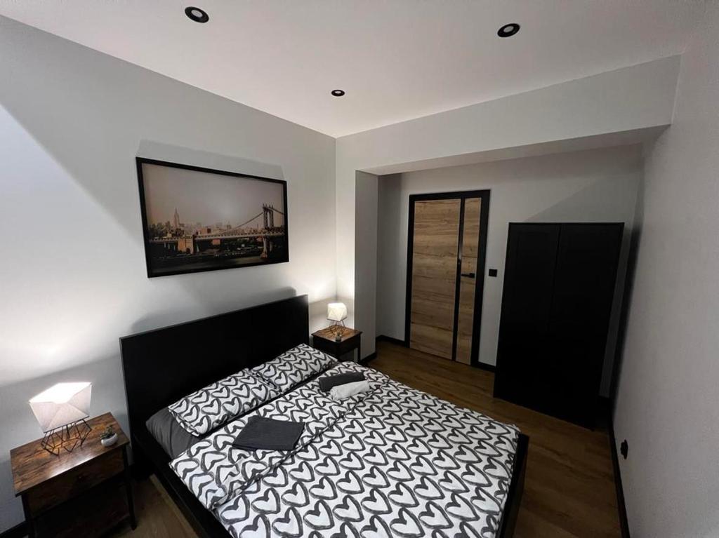 Posteľ alebo postele v izbe v ubytovaní Apartament Helsinki