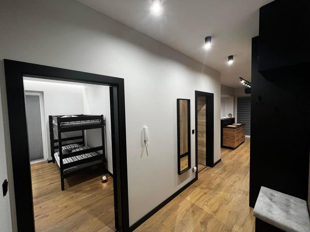 Posteľ alebo postele v izbe v ubytovaní Apartament Helsinki