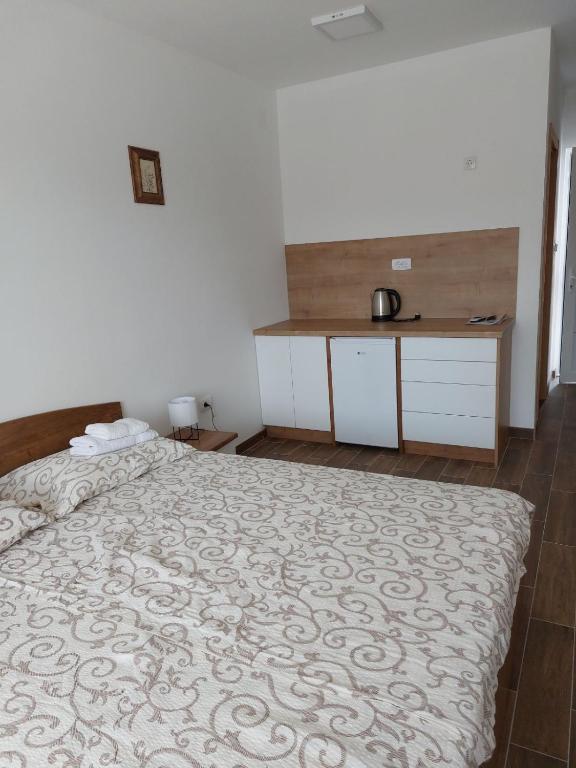 Postel nebo postele na pokoji v ubytování Srebrna Laguna