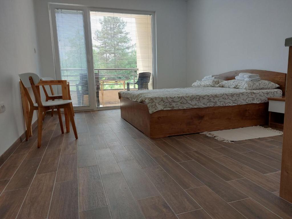 Postel nebo postele na pokoji v ubytování Srebrna Laguna