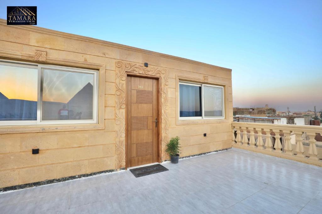 Een balkon of terras bij Tamara Pyramids View