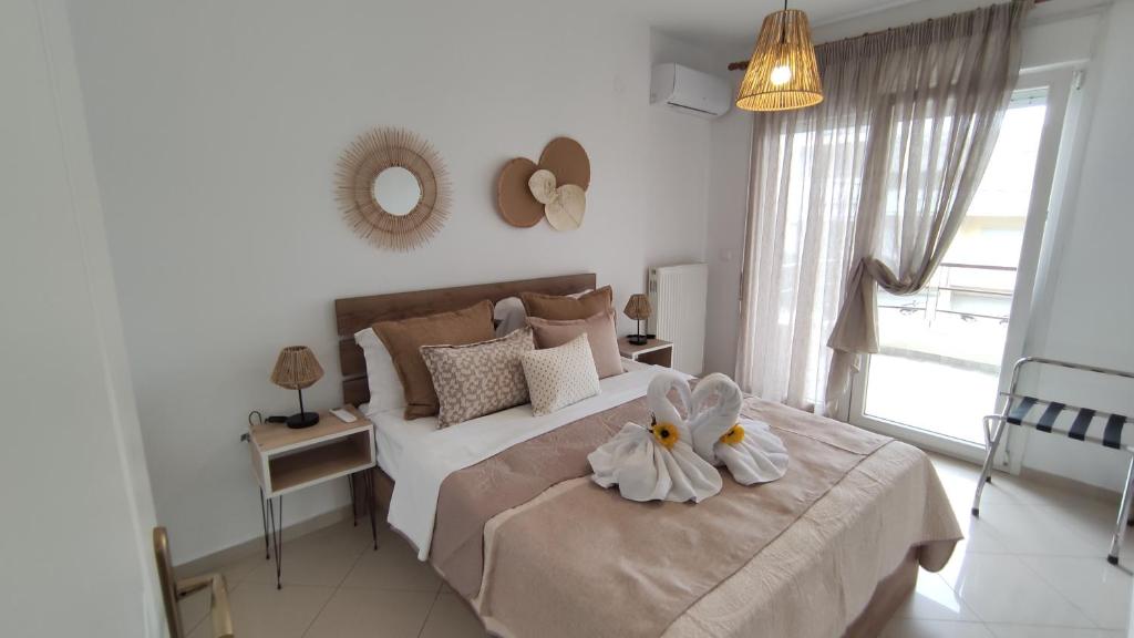 Posteľ alebo postele v izbe v ubytovaní Evris House oasis