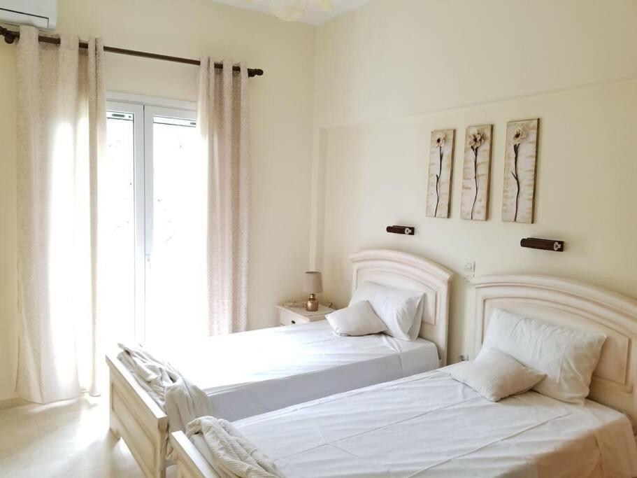 Postel nebo postele na pokoji v ubytování Corfu Escape Four