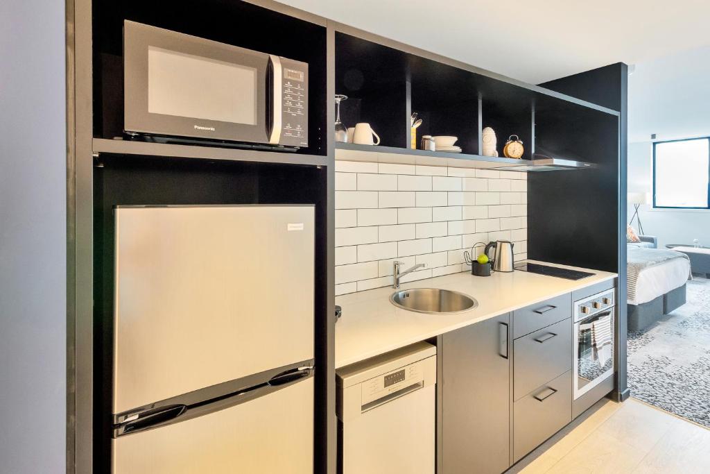 Roomie Apartment Hotel廚房或簡易廚房