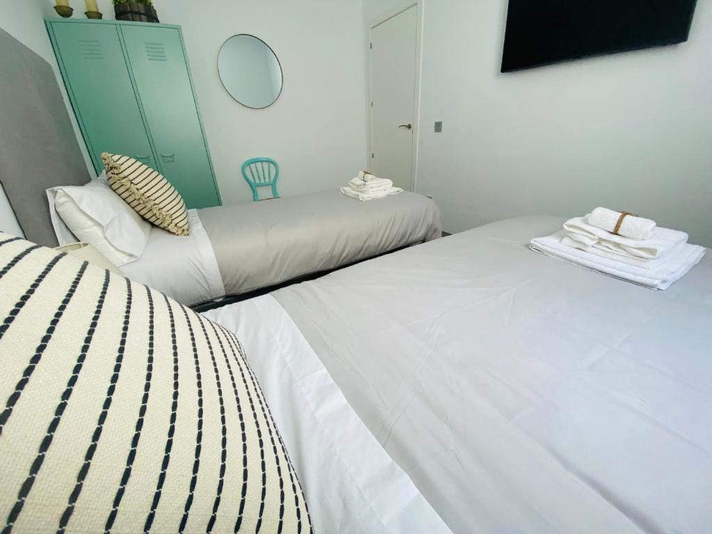 Posteľ alebo postele v izbe v ubytovaní Bonito Apartamento de 2 habitaciones con terraza
