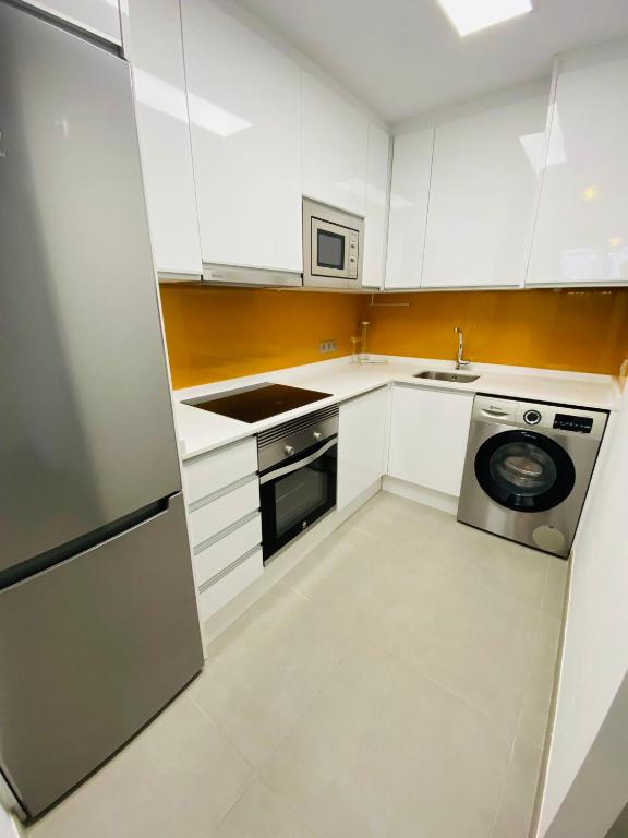 Kuchyňa alebo kuchynka v ubytovaní Bonito Apartamento de 2 habitaciones con terraza