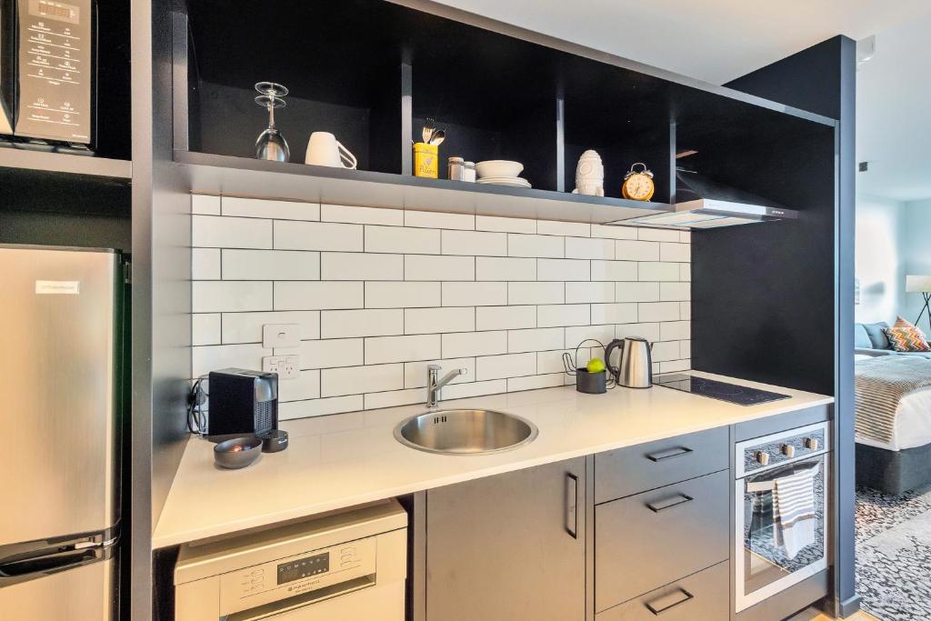 Roomie Apartment Hotel廚房或簡易廚房
