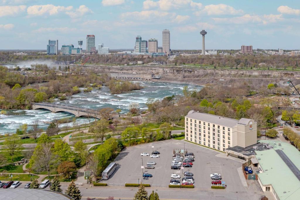 an aerial view of a large parking lot next to a river at Comfort Inn The Pointe in Niagara Falls