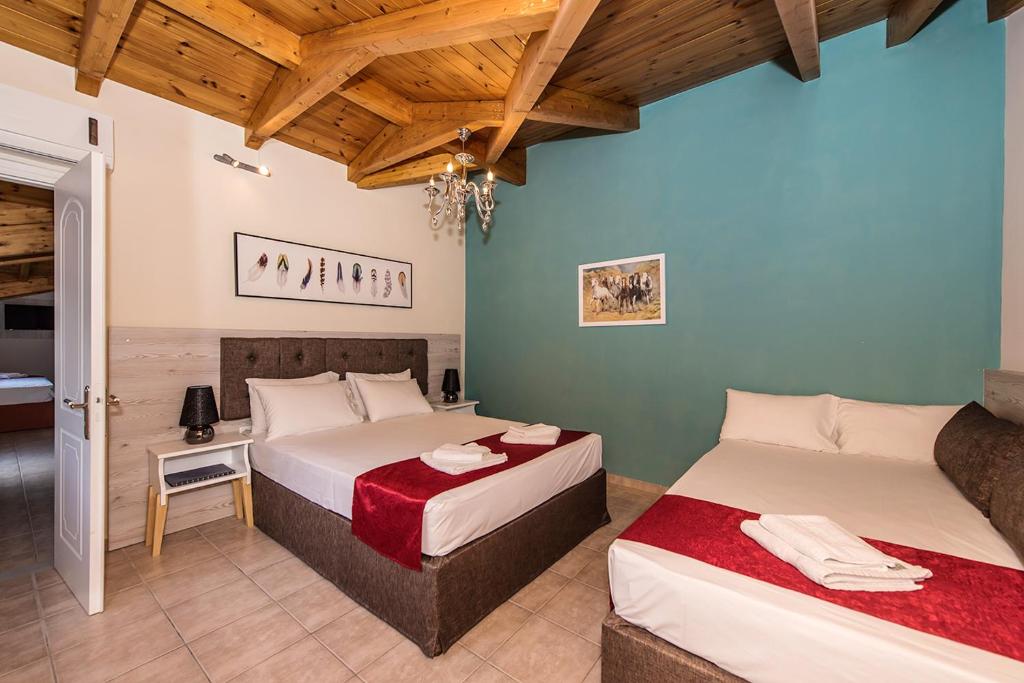 Postel nebo postele na pokoji v ubytování Andretina Sea View Apartments