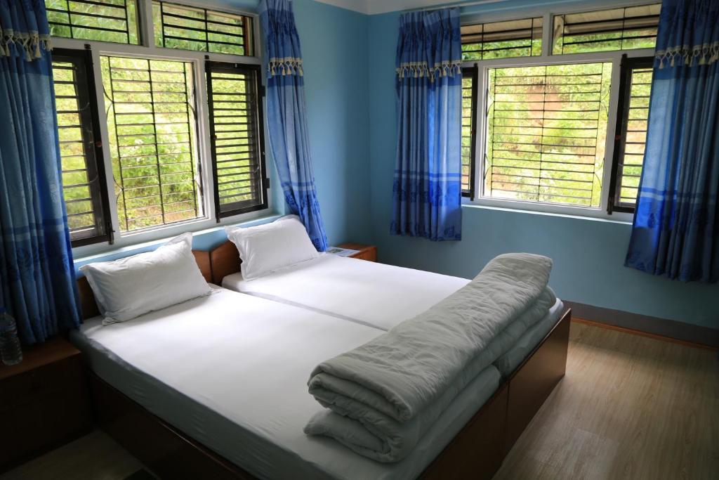 Postel nebo postele na pokoji v ubytování Hotel Mount Paradise