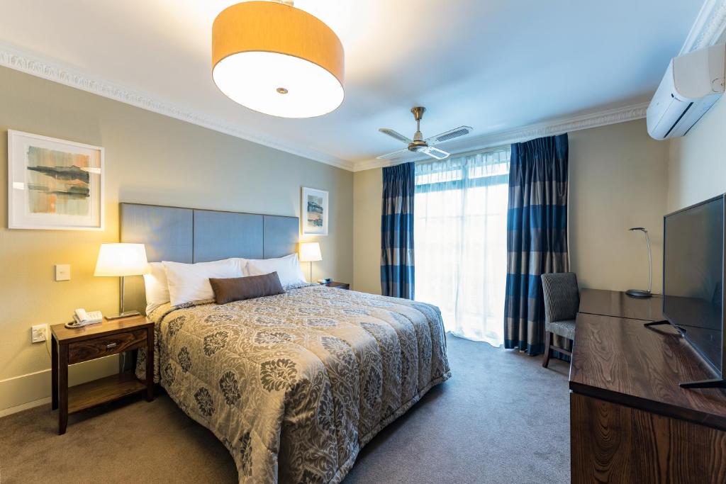 Postel nebo postele na pokoji v ubytování Distinction Hotel Rotorua