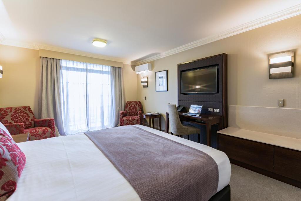 TV a/nebo společenská místnost v ubytování Distinction Hotel Rotorua