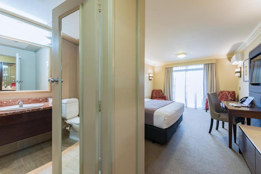 Postel nebo postele na pokoji v ubytování Distinction Hotel Rotorua